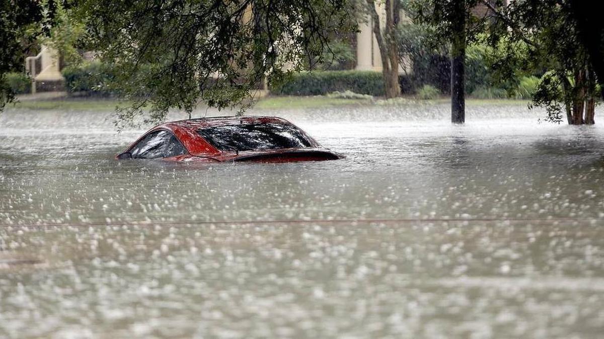 
Several cars are submerged in the flood thoughtout Georgetown on Sunday, Oct. 4, 2015.
