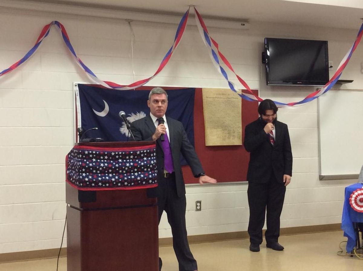 Tim McGinnis speaks to the audience during Wednesday’s District 56 debate in Carolina Forest.