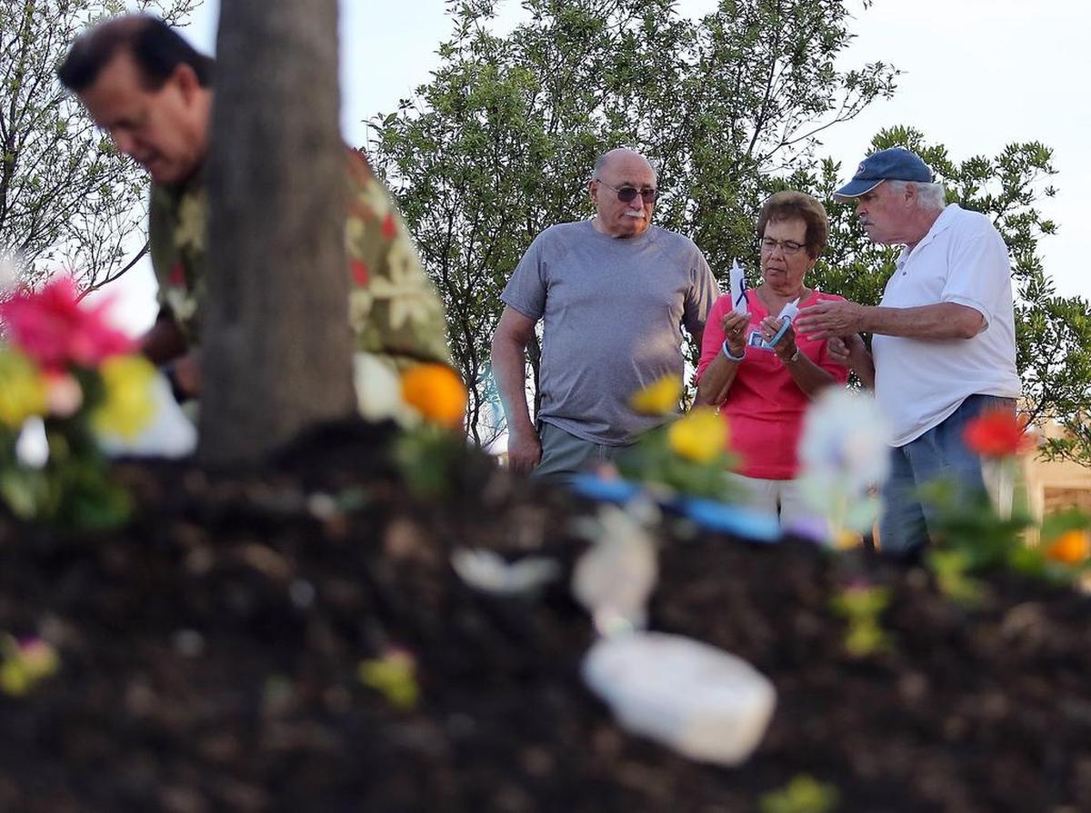 People gather during a Brittanee Drexel vigil on Monday, April 25, 2016. Drexel has been missing from Ocean Boulevard in Myrtle Beach since April 25, 2009. A candlelight vigil was held at the tree planted in Drexel’s honor in Grand Park at The Market Common.