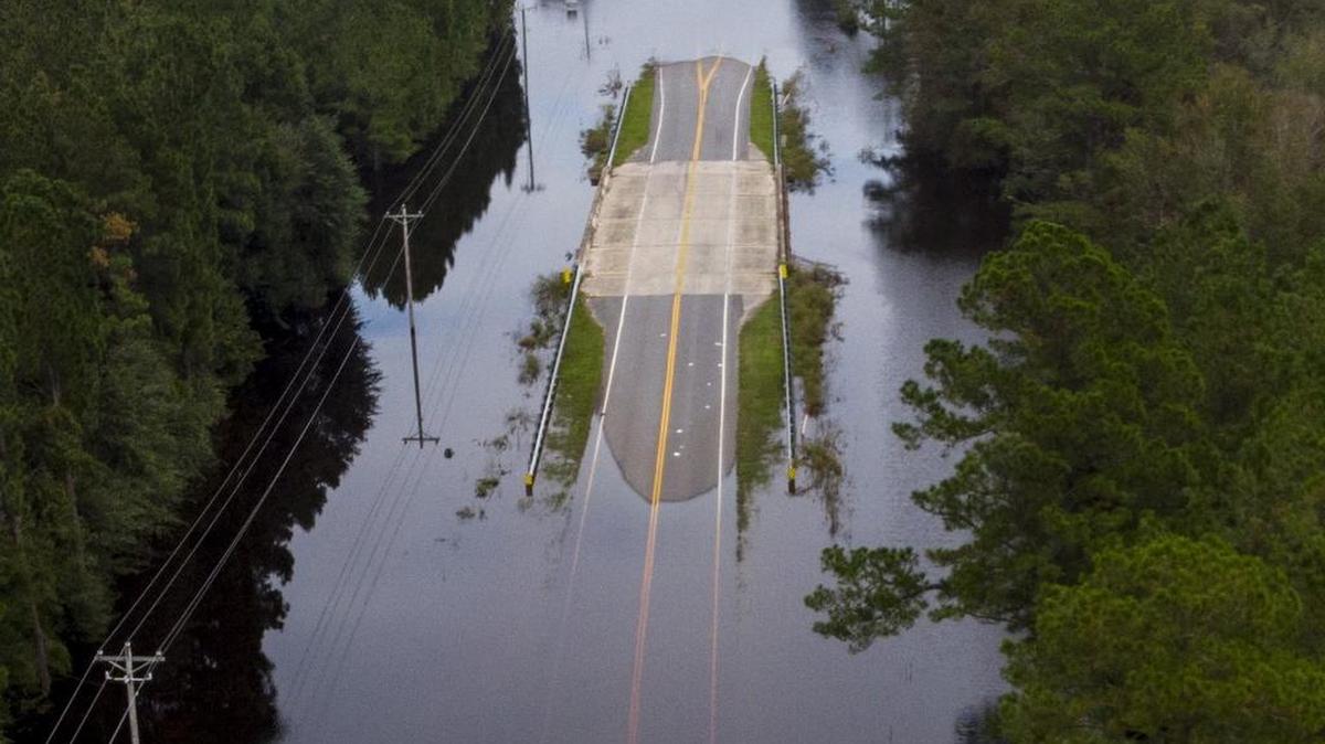 The bridge over Simpson’s Creek is the only dry spot for over a mile on S.C.905 in the Red Bluff Community. The Red Bluff community off S.C.905 has flooded along the Waccamaw River and Simpsons Creek under Hurricane Florence’s deluge with entire neighborhoods underwater. Monday, Sept. 24, 2018.