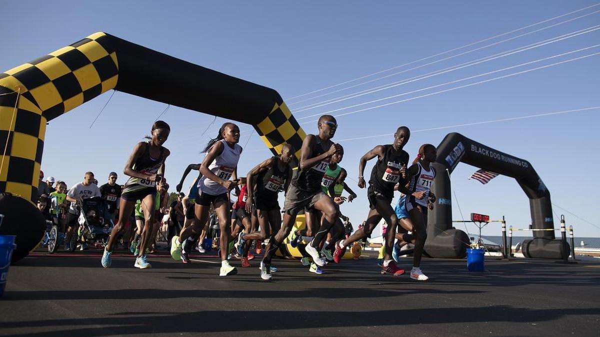 Runners bolt out of the start line of the 5K during the Inaugural International Drive Road Race Sunday at Ocean Bay Elementary School in Myrtle Beach. The event included a 5K, 10K, and 1 Mile Kids Fun Run. Both the 5K and 10K courses were USATF certified and sanctioned. Participants are able to compete in both the 5K and 10K with the top 1st-3rd overall male and female runners receiving cash awards.