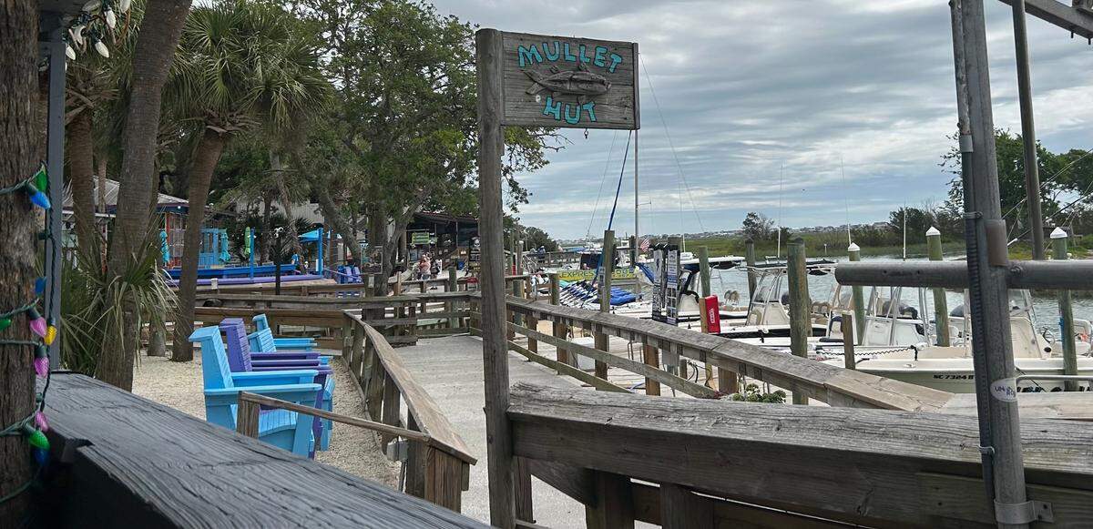 The Mullet Hut is the outdoor bar and seating area between Creek Ratz and J Peters Grill and Bar on the Marshwalk in Murrells Inlet. Photo from May 25, 2023.