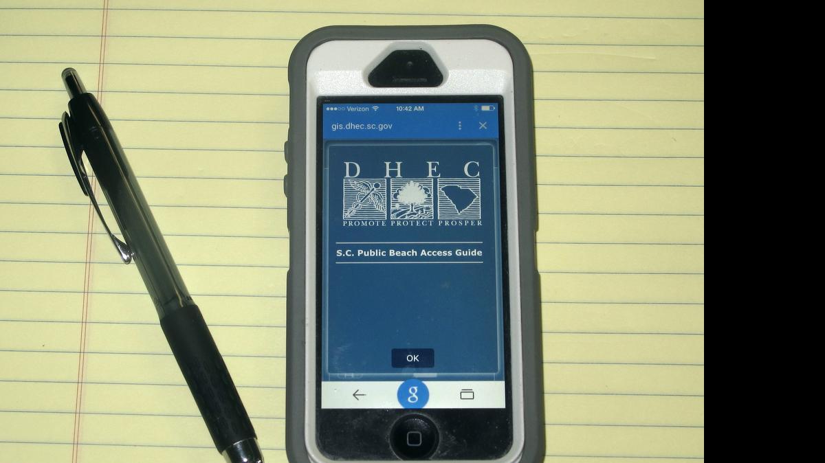 
A smartphone showing the South Carolina Department of Health and Environmental Control's new Beach Access Guide site is seen in this photograph taken in Charleston. on May 28. 2015. The new interactive site provides information on hundreds of public beach access points along the state's 190-mile coastline. 
