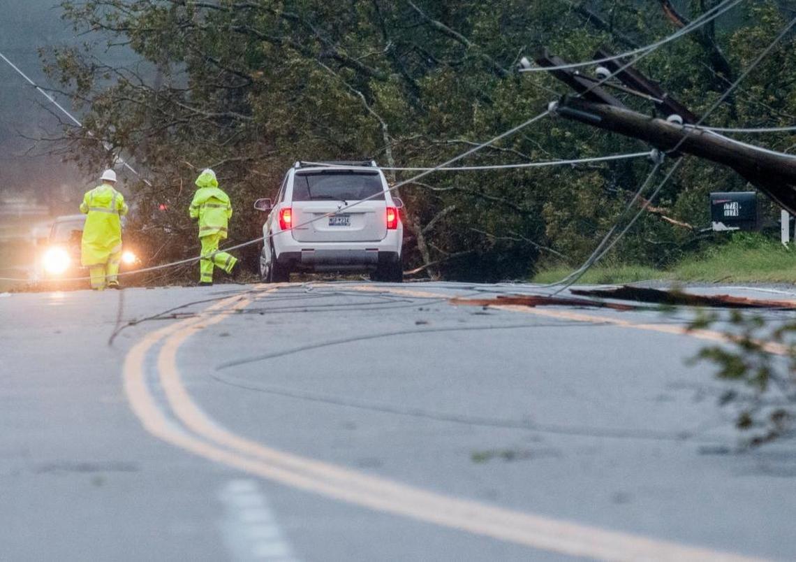 A vehicle was tangled in a downed power line which caused sparks to fly at Nixon's Crossroads on U.S. Hwy. 90. Saturday, Oct. 8, 2016.