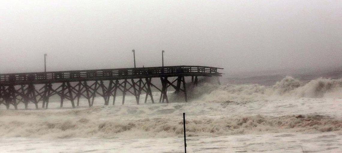 Surfside Beach Pier on Saturday, Oct. 8, 2016, as high tide came in.