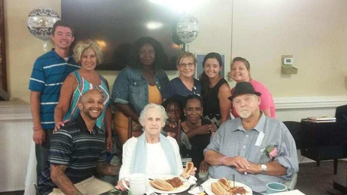 Friends, family and staff gather to celebrate the marriage of Micke and Osborne.