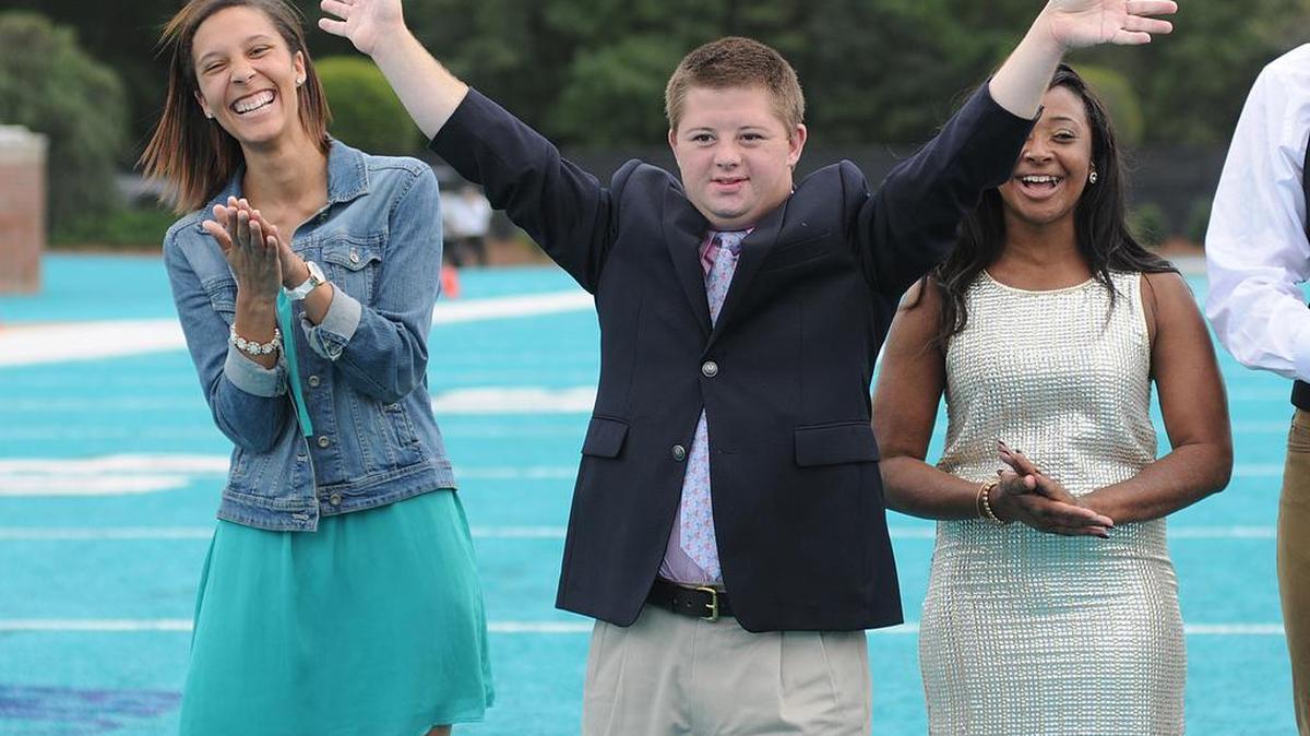 
Chip Mullen waves to the fans at the Coastal Carolina football game Saturday where he was announced as this year's homecoming king. 
