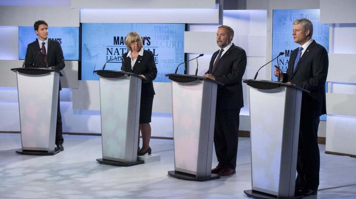 
Leaders of Canada’s four political parties (left to right), Liberal leader Justin Trudeau, Green Party leader Elizabeth May, New Democratic Party leader Thomas Mulcair and Conservative leader Prime Minister Stephen Harper exchange views during the first leaders debate Thursday.
