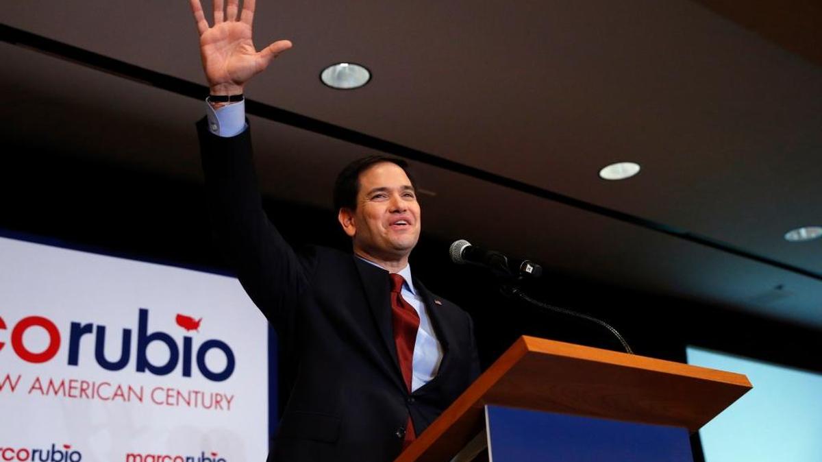 Republican presidential candidate Sen. Marco Rubio, R-Fla., waves to supporters at a caucus night rally Monday, Feb. 1, 2016 in Des Moines, Iowa. (AP Photo/Paul Sancya)