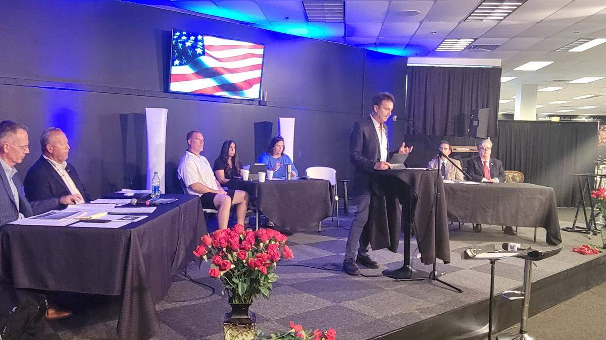Horry County GOP chairman Roger Slagle, center, presides over a July 7, 2022 hearing at Journey Church in Murrell’s Inlet where defeated County Council chairman Mark Lazarus, left with attorney Butch Bowers, lost an appeal for a new election. Pictured at right is incumbent Johnny Gardner and his attorney, Jarrett Bouchette.
