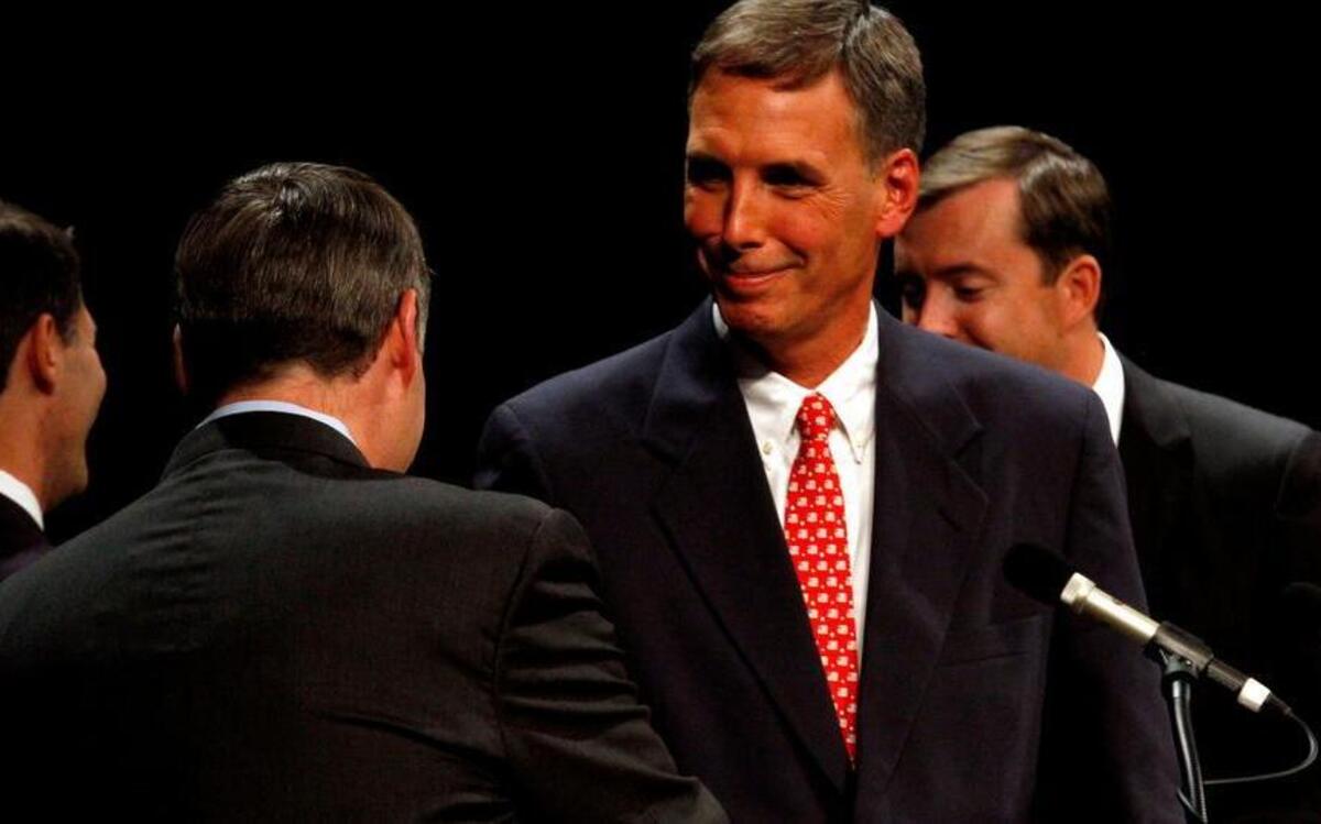 
Tom Rice shakes hands with other candidates after a debate in this file photo.
