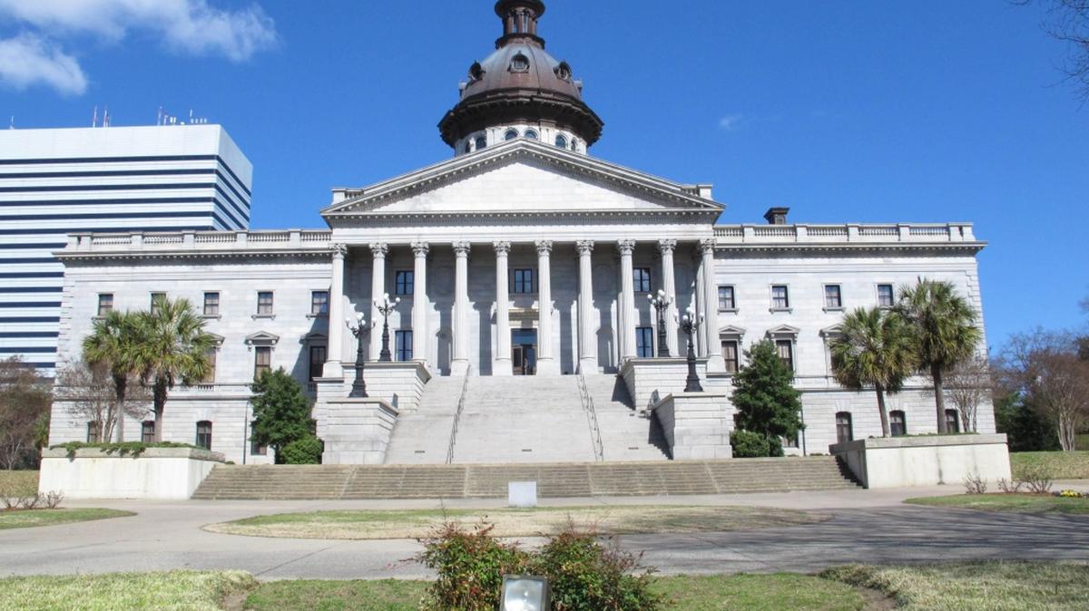 The South Carolina Statehouse is seen on Thursday, March 13, 2014, in Columbia, S.C. Four challengers to U.S. Sen. Lindsey Graham signed an agreement Thursday on the steps of the Statehouse, that said if any of them make a runoff against the Republican incumbent, the other three will throw their support behind the challenger.