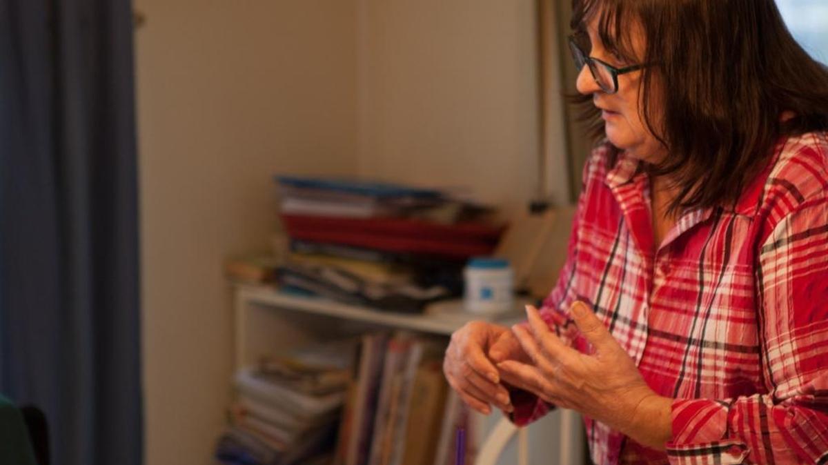 “I do just about everything for her.” Rosemary Flaska counts on her fingers the places she has to go before returning to the home of Geraldine Sheehan (not pictured). Flaska spends the first part of each with Gerry, who has limited mobility.
