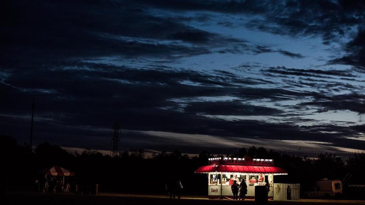 The sun sets on a Daley's Dogs at the Rockin' 4 Relief Concert Sunday evening at the Columbia Historic Speedway in Cayce. Headliners for the flood fundraising event included Billy Gibbons. The flood fundraising event was scheduled to feature Stevie Wonder as a headlining act but the performer was unable to make the trip from Charlotte.