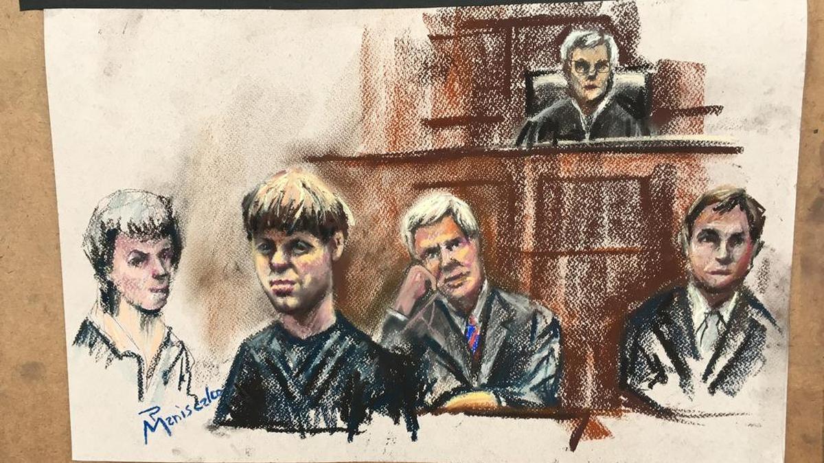 Dylann Roof, center left, sits with one of his attorneys, David Bruck, during jury screening in federal court this week in Charleston. On the far right is federal prosecutor Jay Richardson.