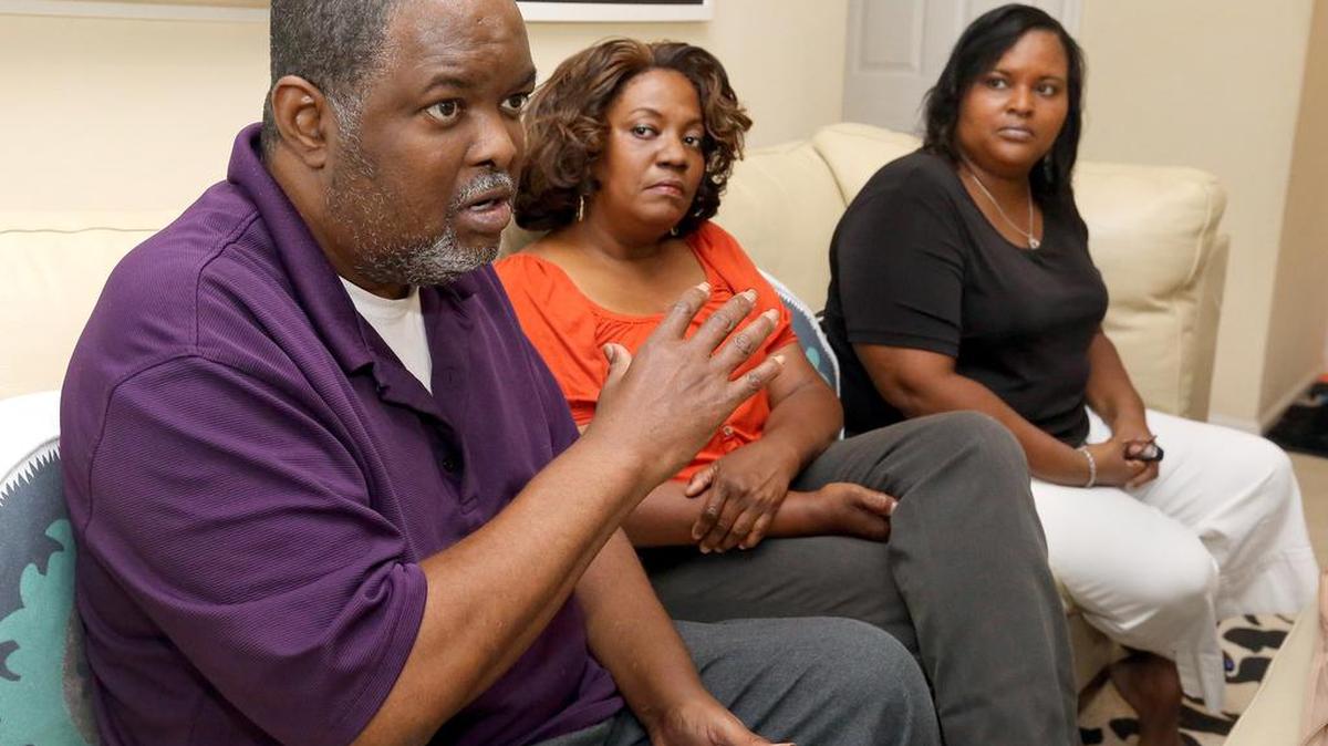 Army veteran German Leon, left, his sisters Marta Sallie, center, and Anna Judge talk about what it has been like to be with each other after 32 years apart.