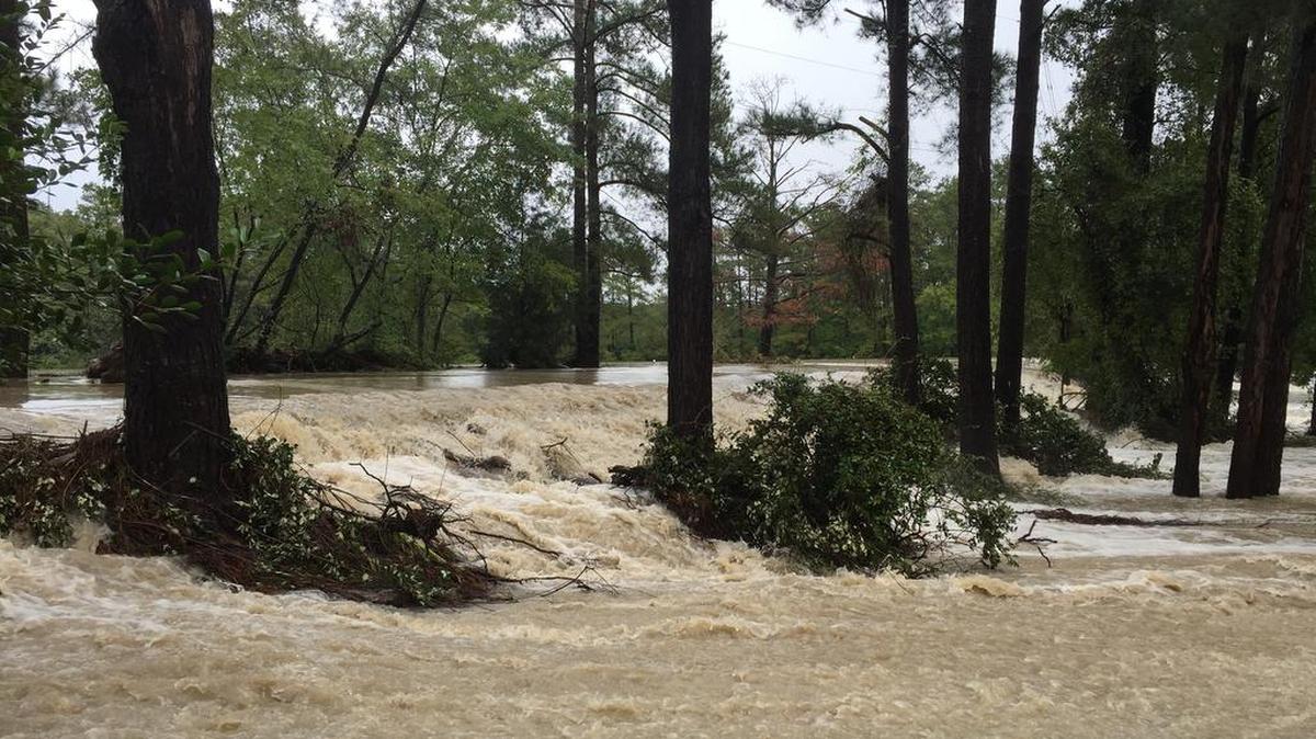 Failing dams can release a deluge of water, as is pictured here from a 2015 flood in Columbia.