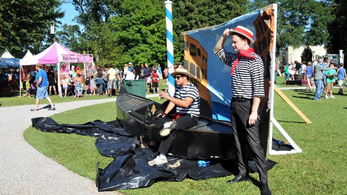 A photo opportunity with gondoliers awaited visitors to the 2014 Italian Festival in Columbia. Meal tax revenues help pay for promoting events that feature various cultures and parts of the world.