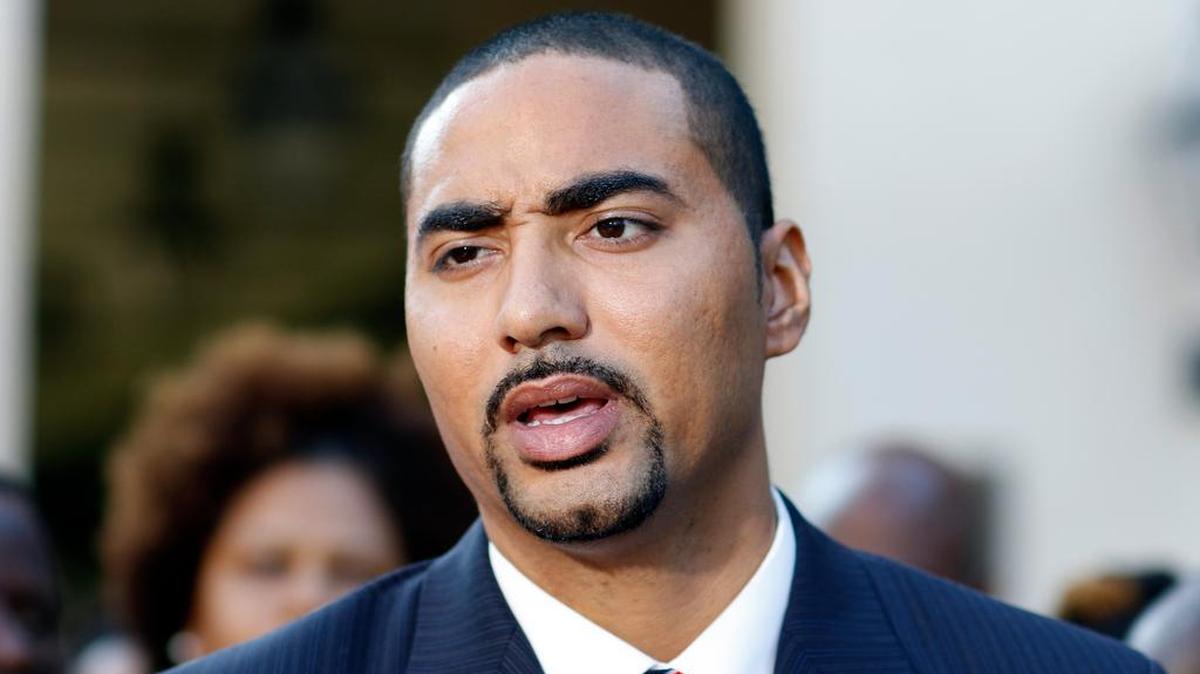 FILE- In this Thursday, Sept. 10, 2015 file photo, Attorneys for Walter Scott's family, Justin T. Bamberg answers questions during a news conference after a bail hearing for former North Charleston police officer Michael Slager, in Charleston, S.C. South Carolina legislator, Rep. Justin Bamberg, wants to bar law enforcement agencies from setting traffic ticket quotas or evaluating officers by the number of citations they write, saying that forces officers to pull people over for minor violations. Bamberg, an attorney for the family of Walter Scott, points to ex-officer Michael Slager’s own defense attorney saying his client wouldn’t have stopped Scott in the first place _ for a broken third brake light _ if not for quotas.