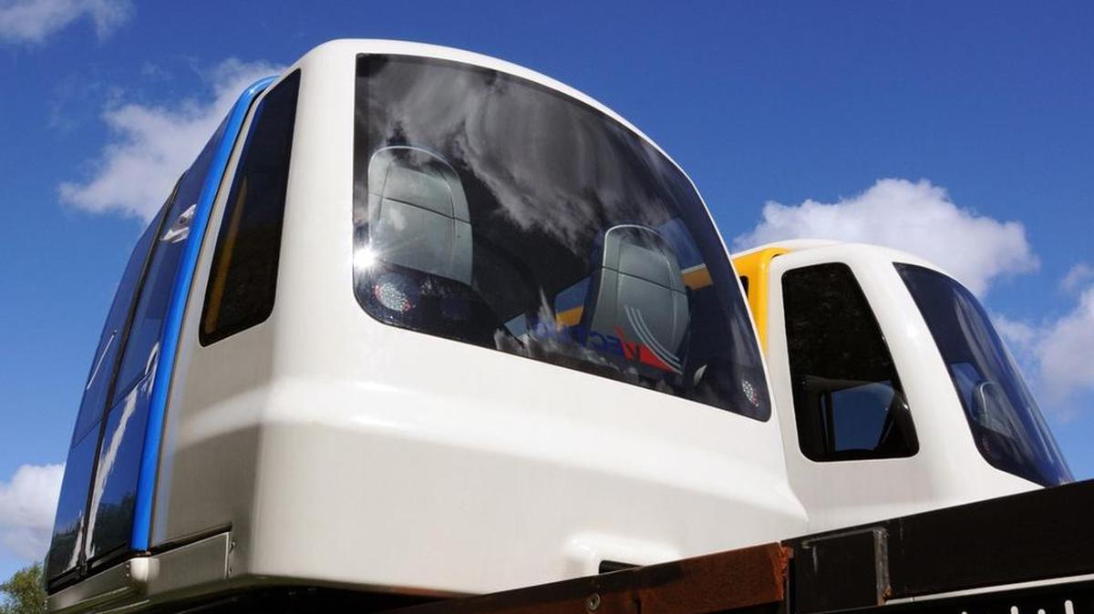 Pod cars, such as these Vectus models, would ferry passengers at Greenville-Spartanburg International Airport from economy lot to terminal, where walks now can be up to a half-mile.