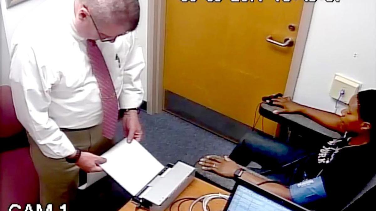 On Aug. 9, 2017, Capt. Matthew Averill, with the Beaufort County Sheriff's Office, looks over the printed results of a polygraph test taken by then Sgt. Selena Nelson, seated, stemming from an incident that happened July 31, 2017 at a Bluffton store. It was later determined that Nelson's polygraph examination results contained signs of attempted deception. Nelson was later fired for misconduct and dishonesty.
