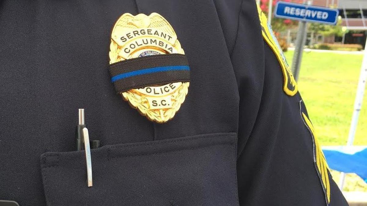 Columbia police wore bands across their badges Friday to commemorate the slaying of five Dallas officers.
