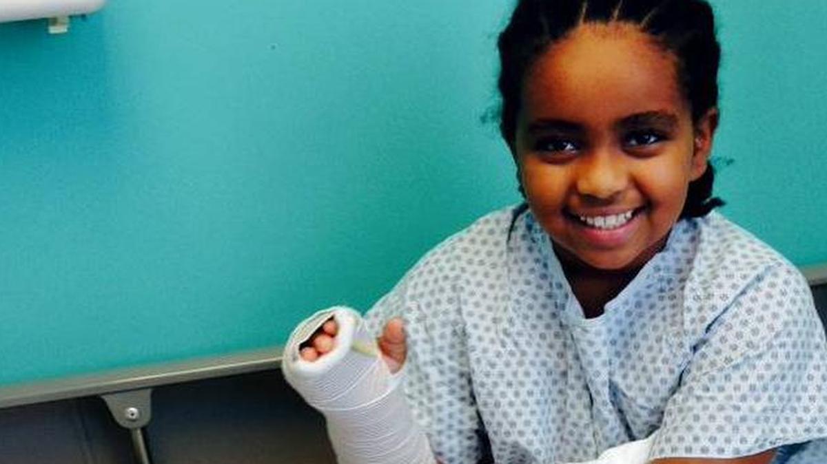 
Meti Kershner, 9, on the road to recovery with a new friend in an Atlanta hospital after suffering an apparent shark bite while playing in the surf on Hilton Head Island on Oct. 9. 
