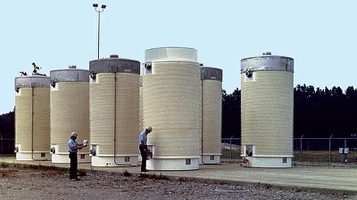 Casks of spent nuclear fuel are stored above ground at many atomic energy plants because there is no national disposal site for the material