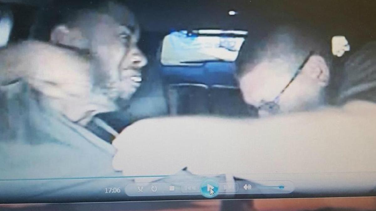 A screenshot of Rico Levern Ross, 32, struggling with a Kershaw County Sheriff’s deputy.