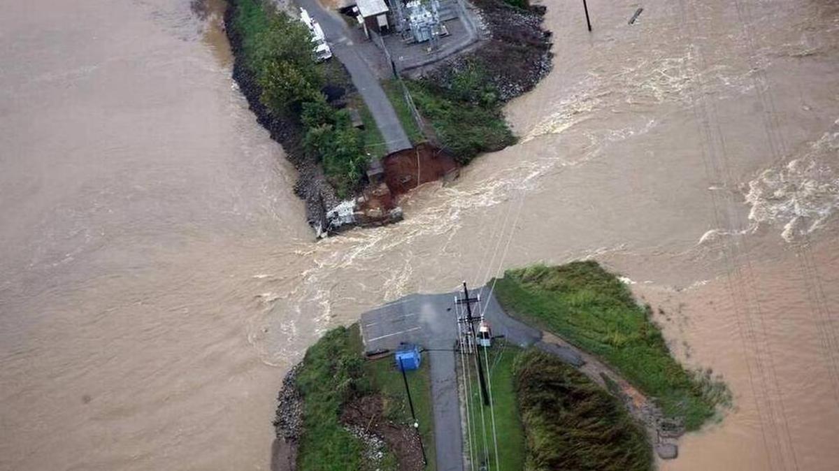 The breach at the Columbia Canal dike, as seen from a National Guard helicopter on Oct. 5.