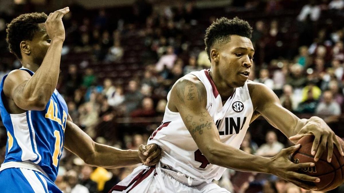 Gamecock freshman Jamall Gregory attempts to corral the ball against Allen University in exhibition play Sunday afternoon at Colonial Life Arena. The Gamecocks will begin their season November 14 against Norfolk State. 11/8/15