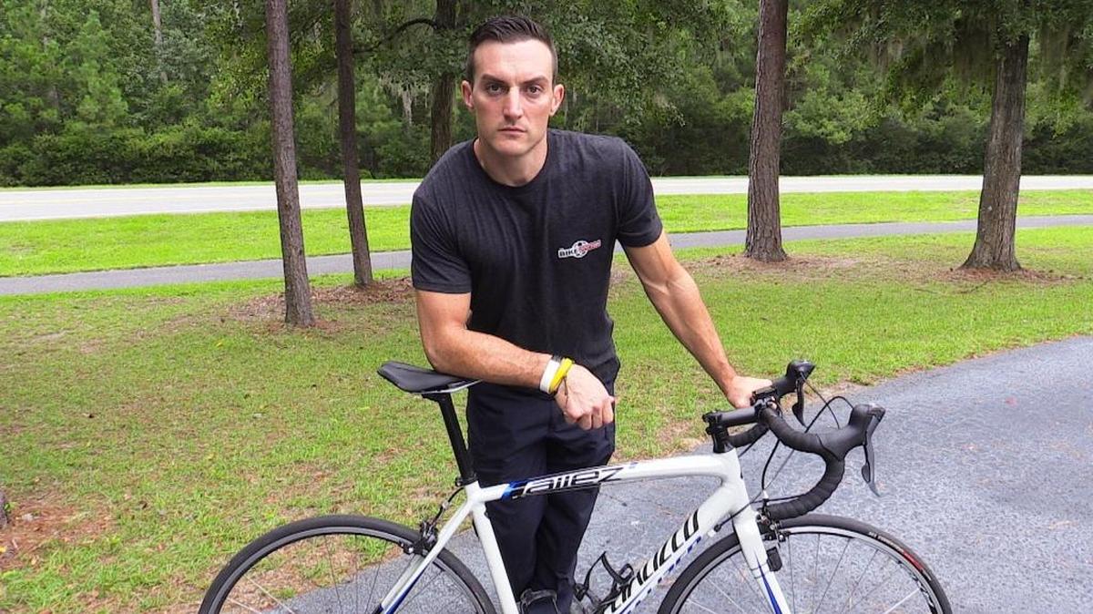 Dominic Socie, a firefigher with Hilton Head Fire and Rescue, poses with one of his bicycles on Sept. 20, 2016. The 32-year-old Hilton Head Island native used one of his bikes to create the white “ghost bike” that sits at the memorial for fallen rider Jeff Garske on the Cross Island Parkway.