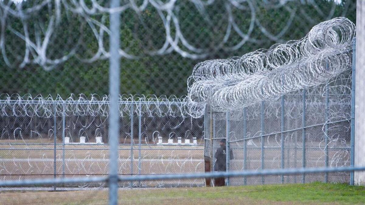 Three people were charged with assisting an inmate at Lieber Correction Institution in a sextortion scheme that netted $146,000 from five victims.