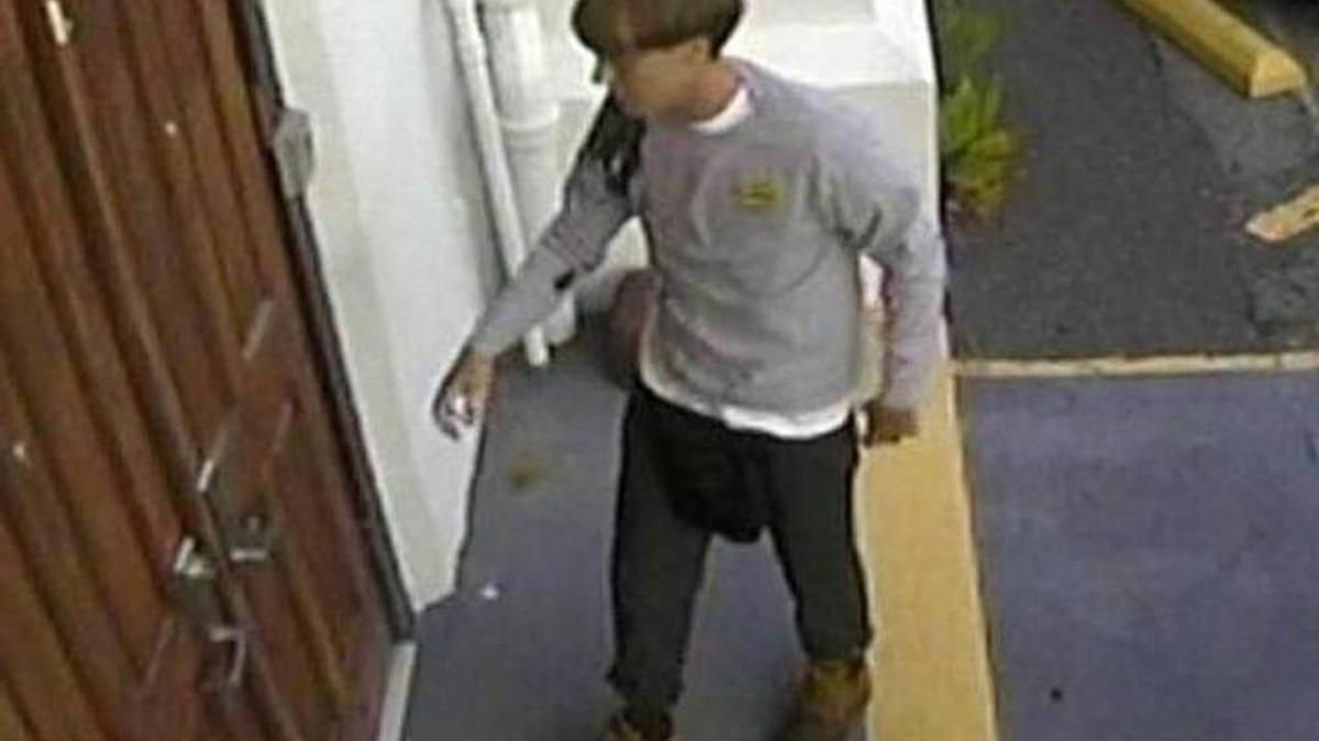 Dylann Roof at the door of Emanuel AME Church