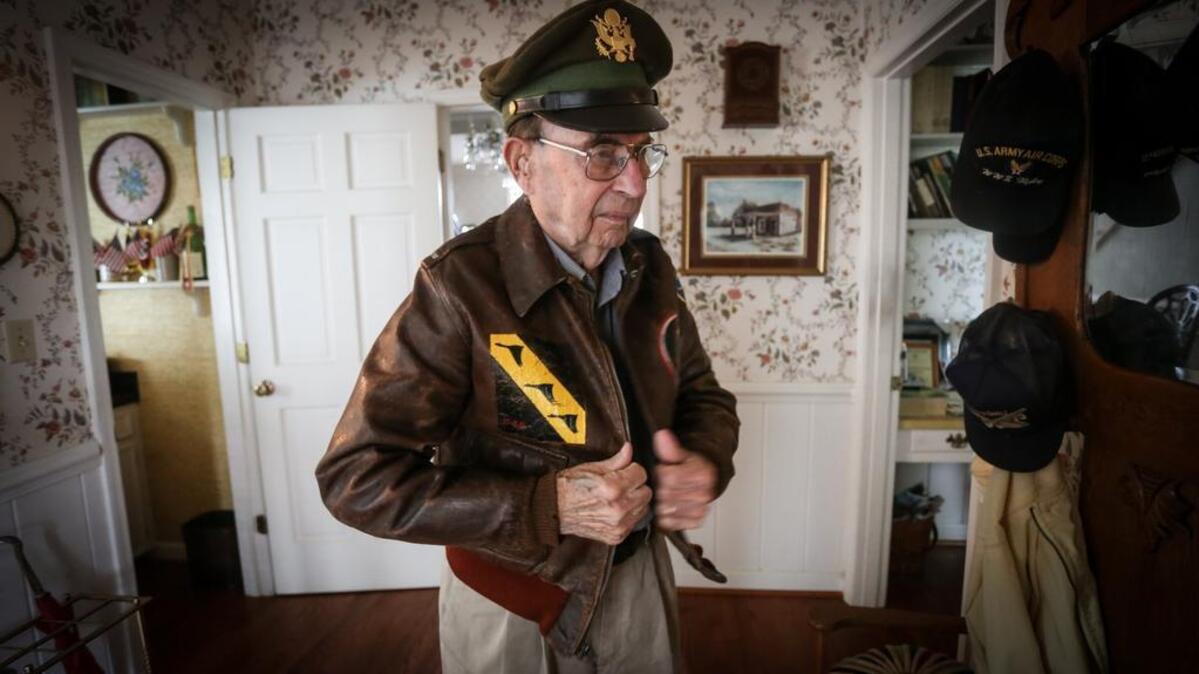 
Murray Price recollects VJ day at his home in Lexington Thursday, August 27, 2015. Price flew 40 missions in the South Pacific during WWII.
