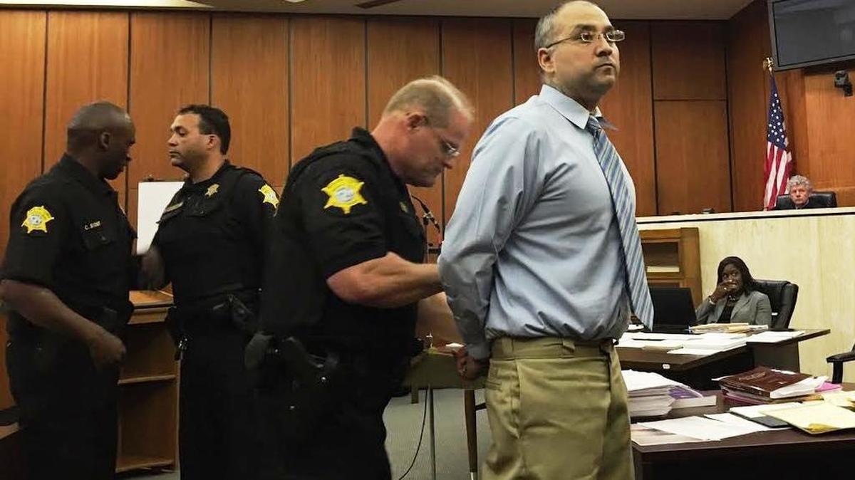 A Richland County deputy uncuffs Nathan Martinez on Tuesday before Martinez acts as his own attorney and questions a woman he is accused of sexually assaulting.