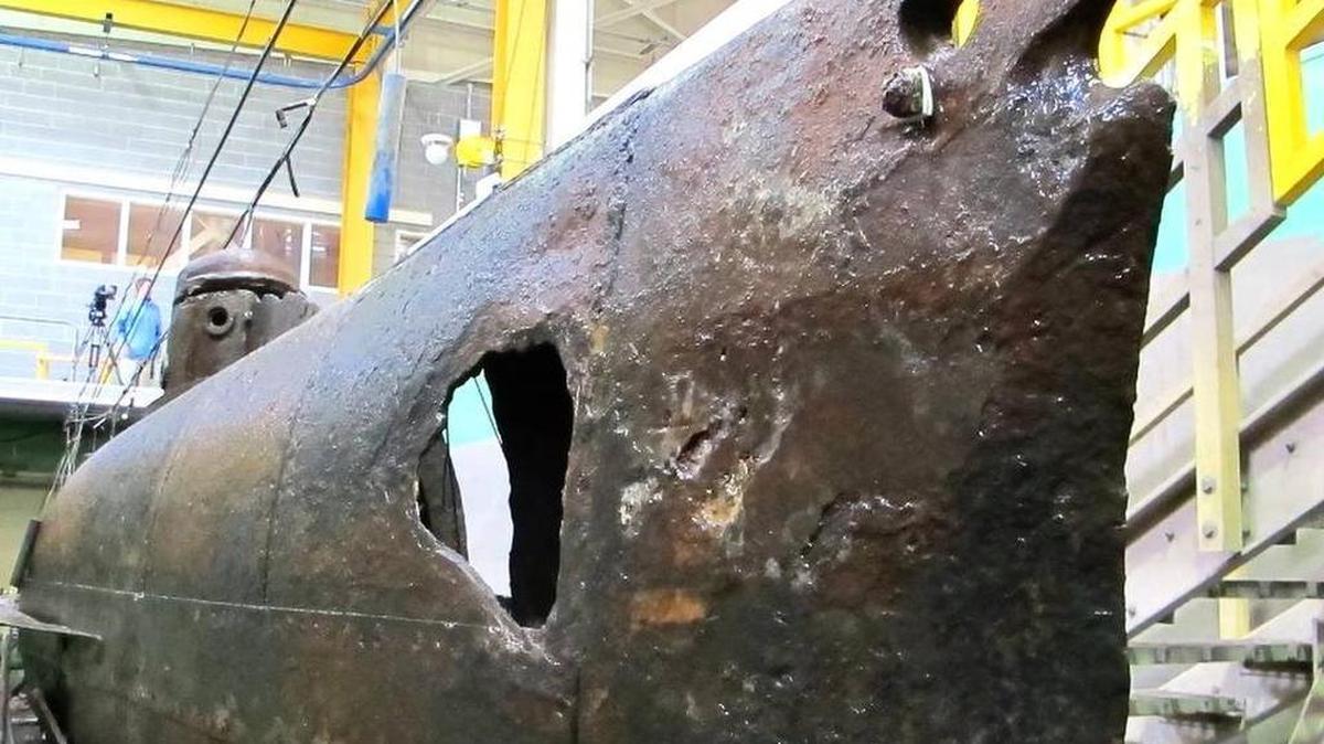 FILE PHOTO: Scientists in 2015 completed a year of work removing encrusted sediment and rust from the H.L. Hunley’s outer hull.