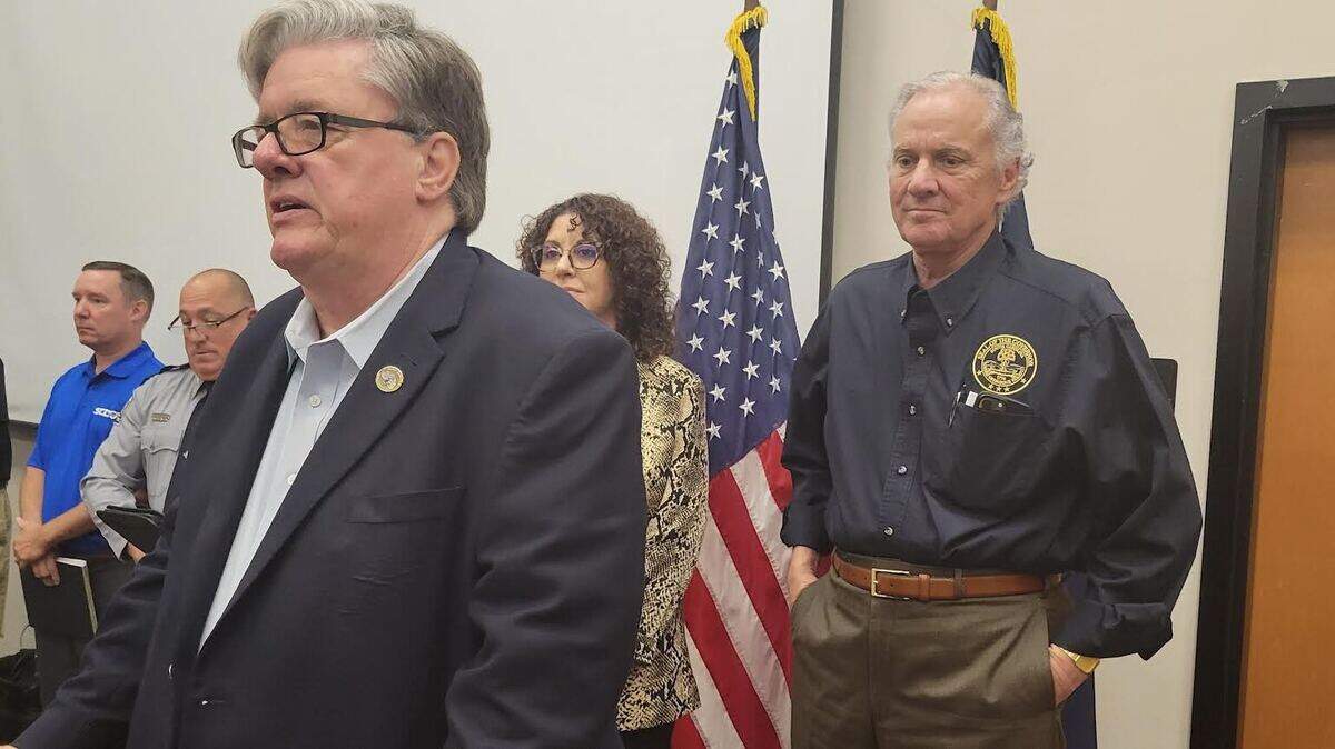 Horry County Council chairman Johnny Gardner, center, speaks to local emergency response officials and reporters on June 3, 2022 as part of a hurricane preparedness meeting with Gov. Henry McMaster, back right.