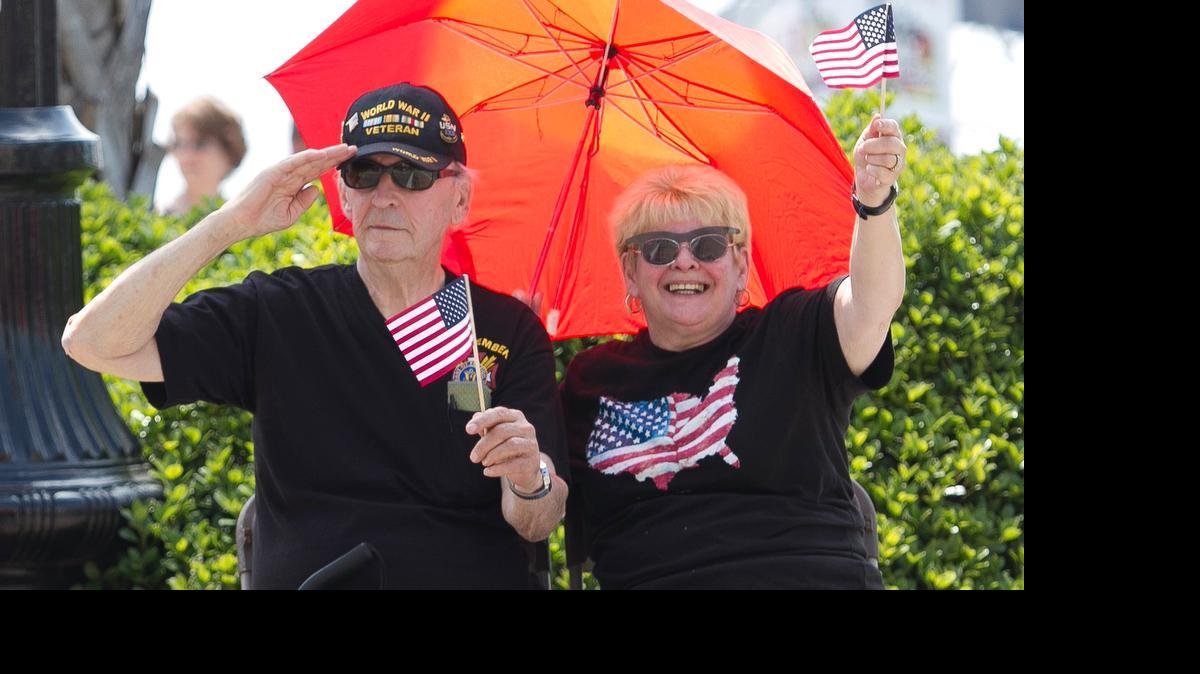 
Ed Ryan of Conway, an 88-year-old World War II Navy Veteran, along with his wife, Marilynne, salutes as fellow veterans pass in the Military Appreciation Days Parade. Veterans groups and supporters cruised Ocean Boulevard May 16 for the Military Appreciation Days Parade.
