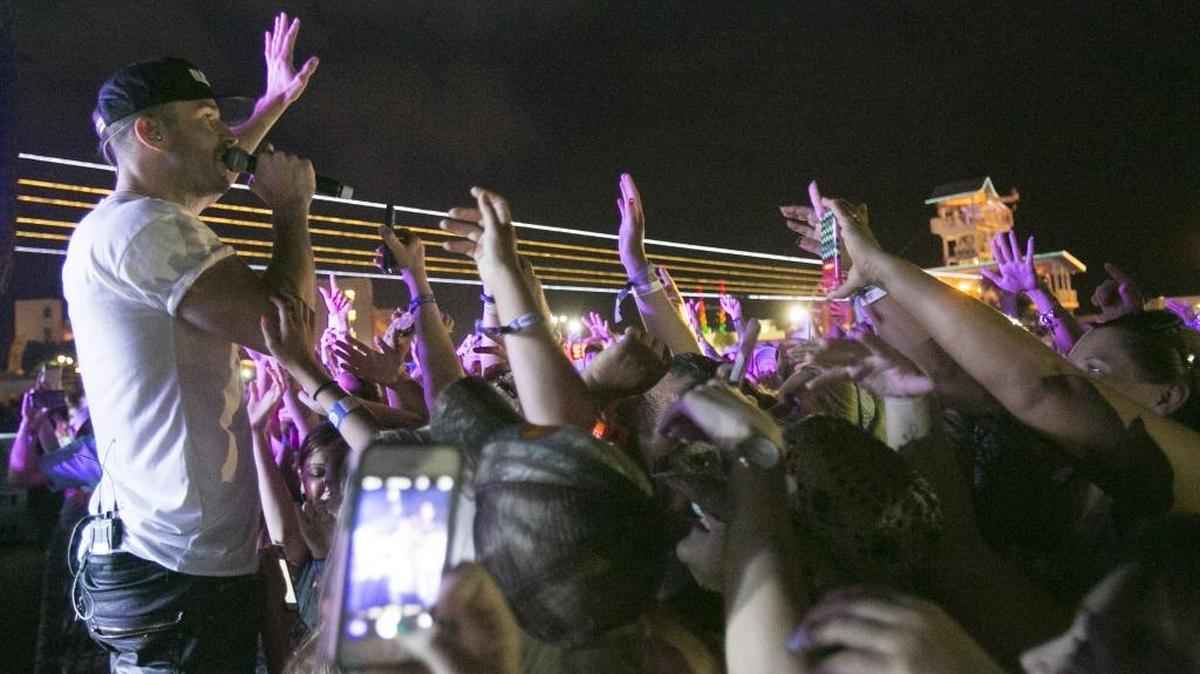 Sam Hunt wades into the crowd of fans at The Carolina Country Music Festival in Myrtle Beach.