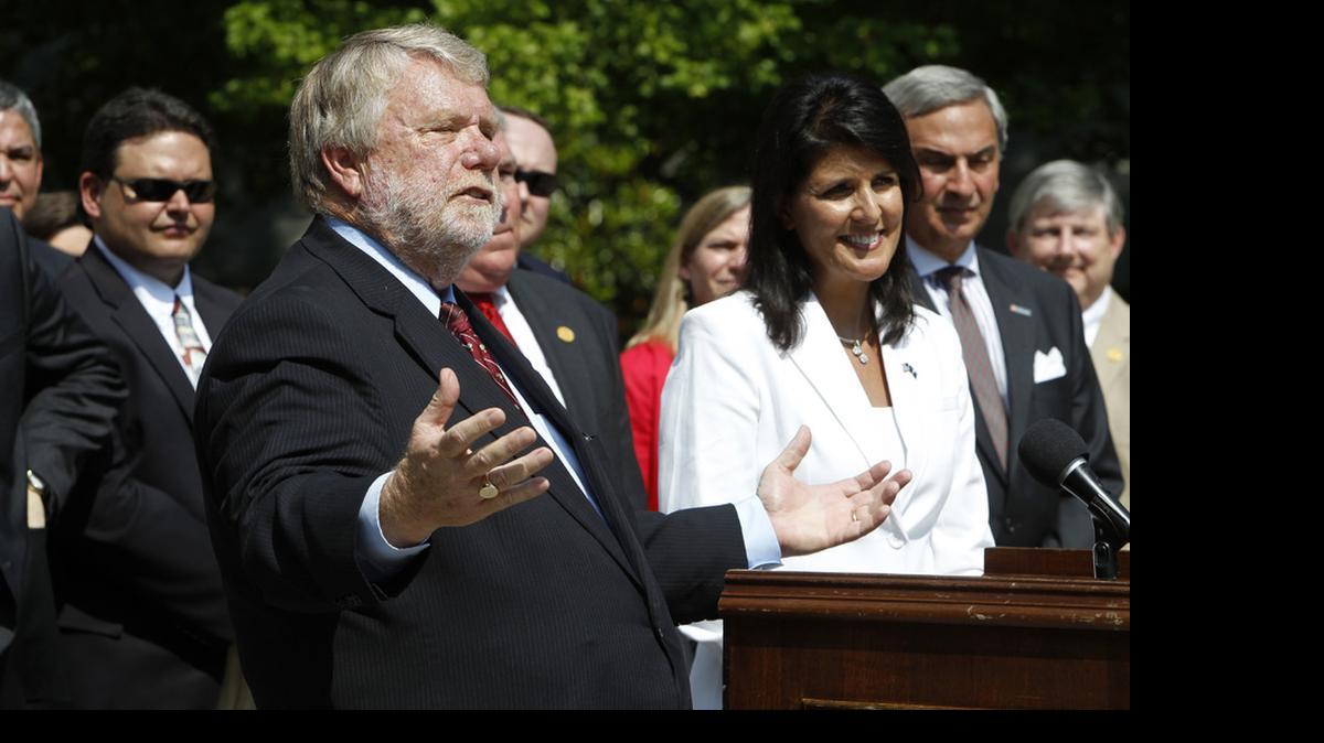 
SC Commerce Secretary Bobby Hitt is joined by Gov. Nikki Haley and state officials outside the Governor's Mansion Complex as theyannounce Volvo will build a $500 million factory in Berkeley County to produce 100,000 cars a year.

