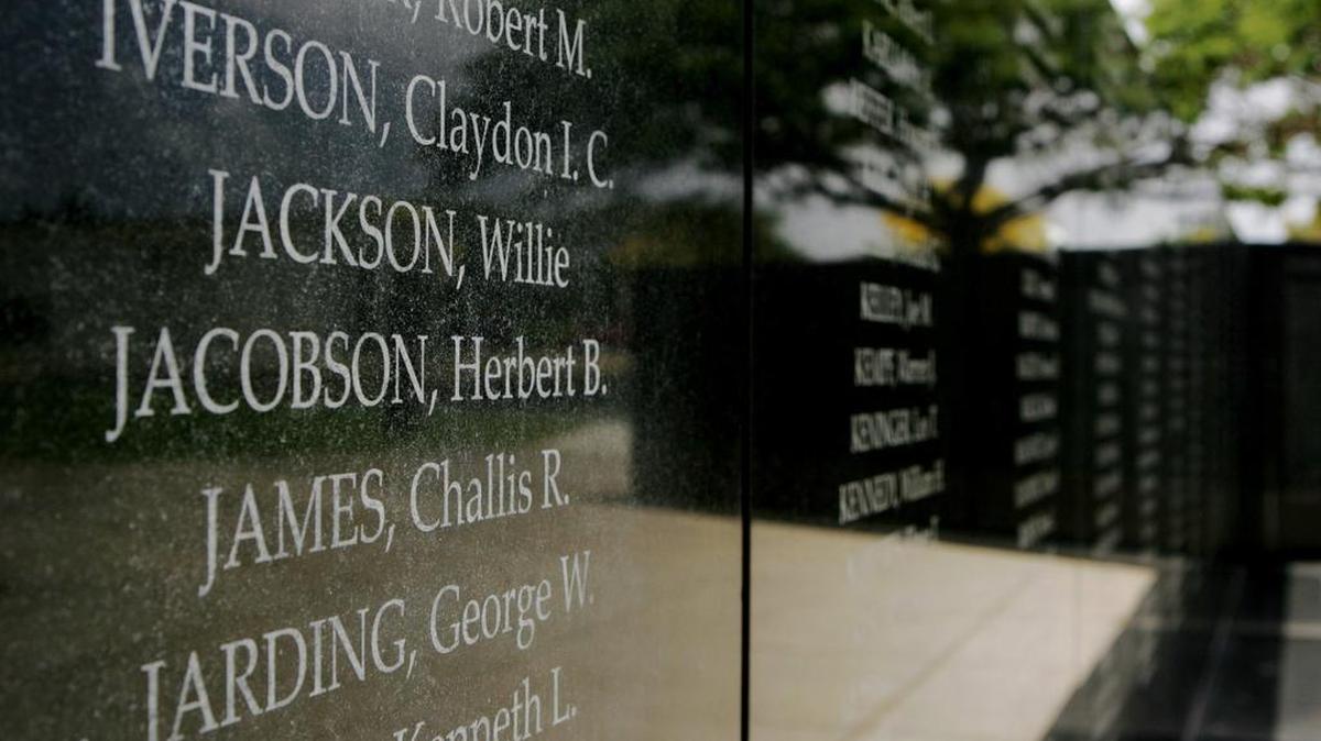 Names are shown on a wall at the USS Oklahoma memorial at Pearl Harbor in Honolulu.