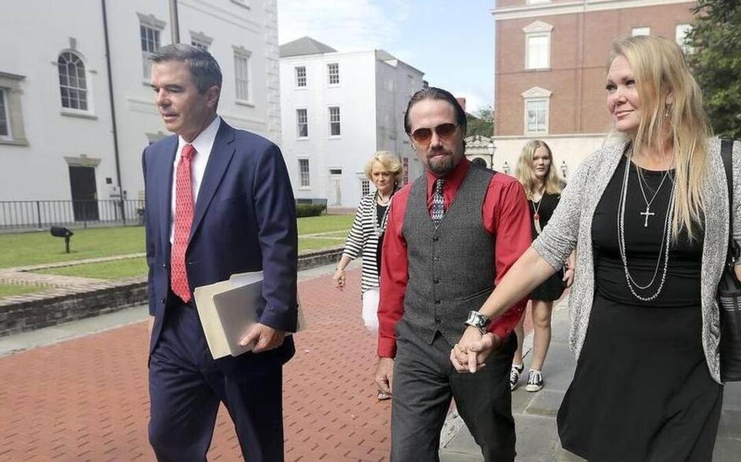 
Hand in hand, Sydney and Tammy Moorer leave the courthouse in Charleston after a bond modification hearing on Thursday, Aug. 6. The couple has been allowed to travel to Orlando, Fla., for a week while Sydney Moorer is interviewing for a job in his field of restaurant maintenance. The ruling stated if he gets a job that requires him to travel to different chain restaurants the jobs must be limited to South Carolina, North Carolina and Georgia. The Moorers are charged with the murder of Heather Elvis. She was reported missing on Dec. 19, 2013, after her car was found at Peachtree boat landing. Her body has not been found. The couple was charged in February 2014. A trial date has not been set.Janet Blackmon Morgan jblackmon@thesunnews.com
