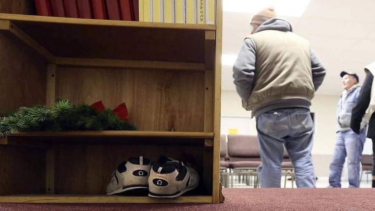 
About 30 people gather at Sun Coast Christian Church Emergency Shelter in Myrtle Beach on Wednesday, Jan. 28, 2015. They are given a warm meal and a place to sleep inside the church as the temperatures outside drop. Photo by Janet Blackmon Morgan / jblackmon@thesunnews.com

