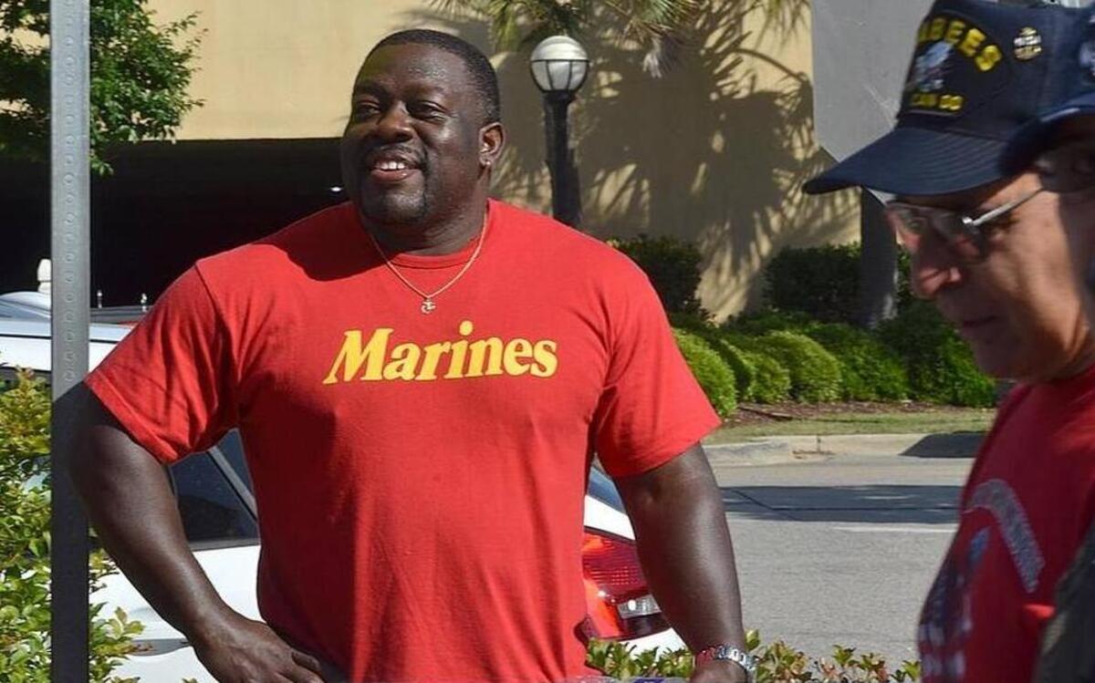 
Bystander Lancer Torain hears Semper Fi from one of the participants in the Veterans March on Memorial Day from 16th Avenue North to Ninth Avenue North on Ocean Boulevard in Myrtle Beach.

