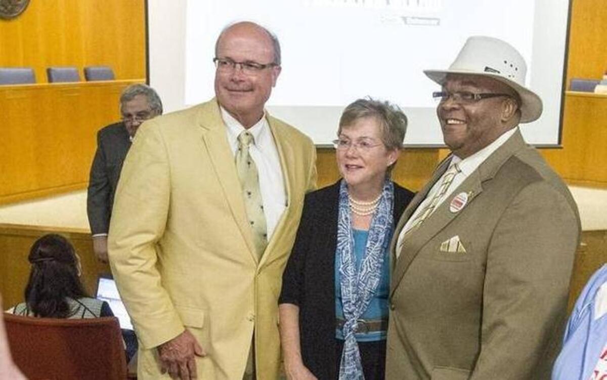 Phil Render, Mary Jeffcoat and Mike Chestnut pose for pictures after winning the three open Myrtle Beach City Council seats Tuesday, November 3, 2015.