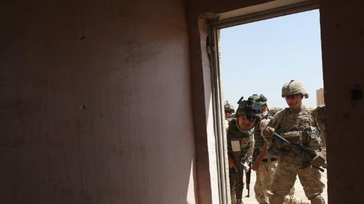 
United States Army trainers instructed Iraqi Army recruits at a military base in Taji, Iraq, in April. The United States now has about 3,000 troops in Iraq. CreditJohn Moore/Getty Images
