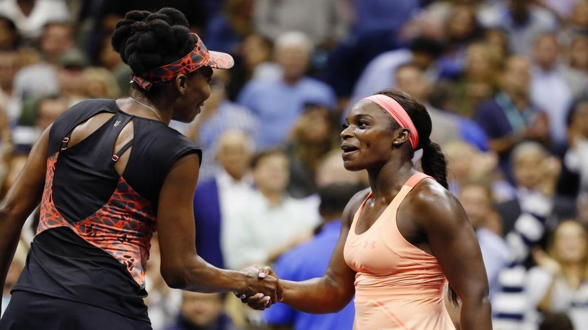 Sloane Stephens, right, shakes hands with Venus Williams after winning their semifinal match at the U.S. Open on Thursday.