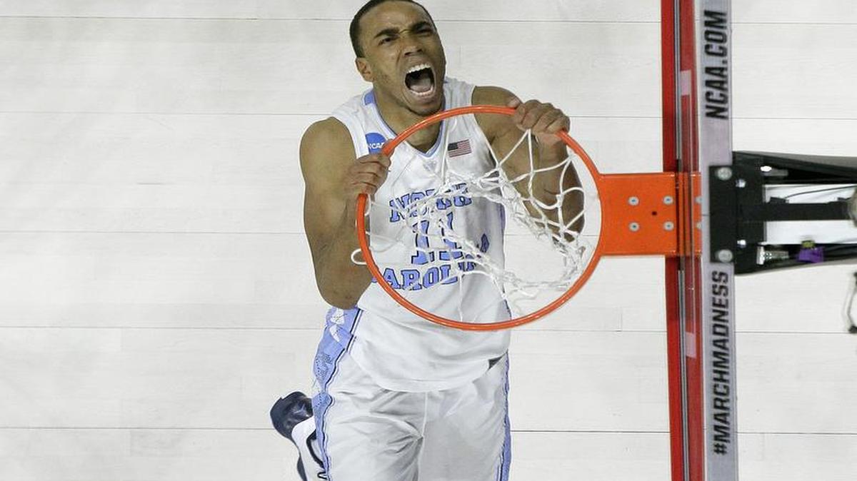 North Carolina forward Brice Johnson (11) reacts after dunking the ball against Providence during the second half of a second-round men's college basketball game in the NCAA Tournament.