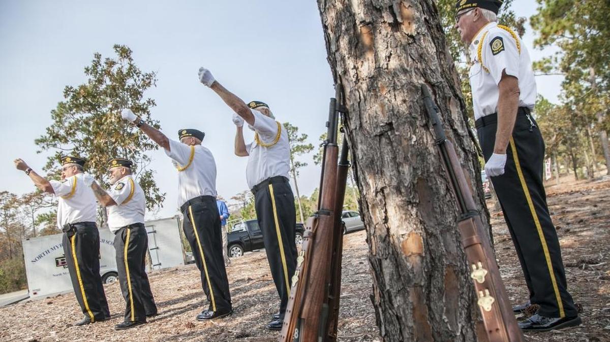 Members of the American Legion Honor Guard rehearse their rifle salutes prior to a Veterans Day celebration last year.